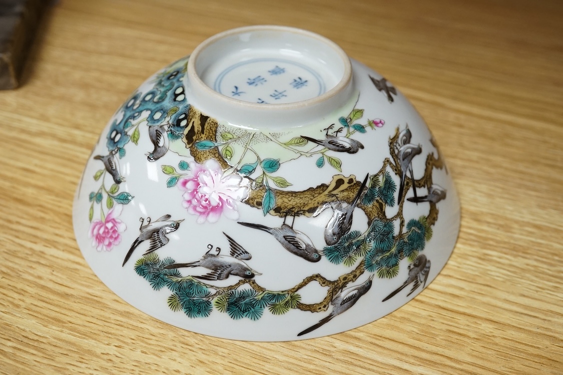 A Chinese famille rose bowl enamelled with birds and flowers, 15cm in diameter